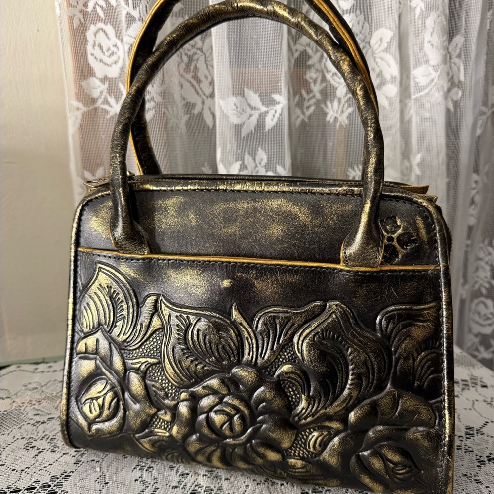 Patricia Nash Paris Black and Gold Tooled Rose Handbag Crossbody